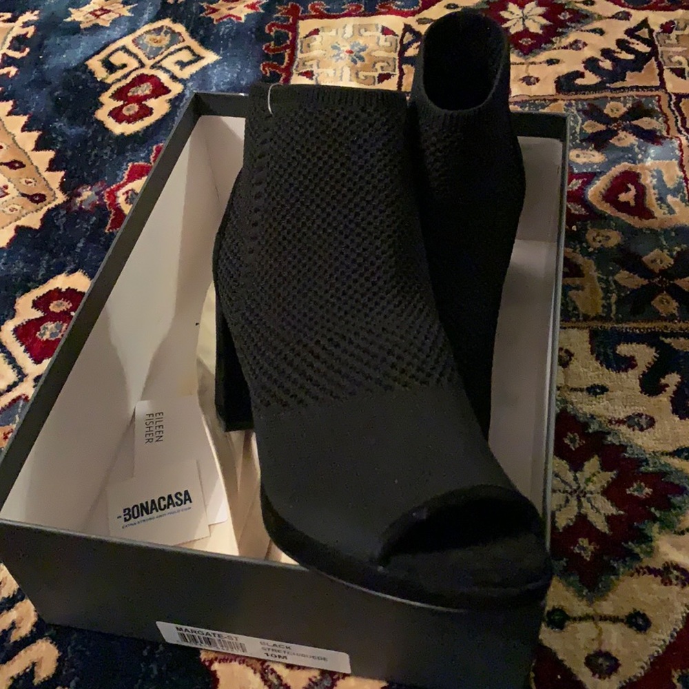 Black peep toe booties NIB with cotton shoe bag.